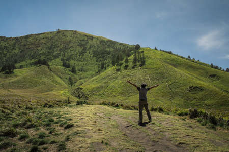 Young man on a mountainの写真素材