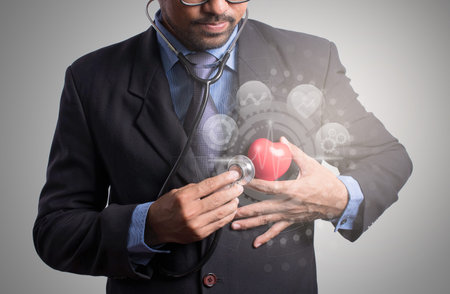 Male heart surgeon with medical health care innovative element on sci fi concept.の写真素材