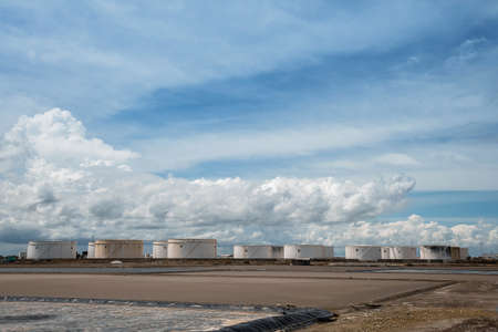 Refinery oil tanks, oil industry business with blue sky.の写真素材