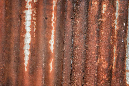 old rusty galvanized, corrugated iron siding vintage texture background, Rusty corrugated metal wall.の写真素材
