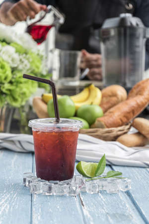 iced tea latte on wood table,の写真素材