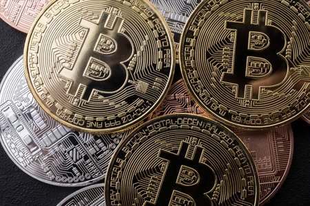 Lot of golden bitcoin coins - virtual money of the worldの写真素材