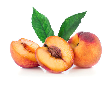 peach with leaf isolated on white backgroundの写真素材