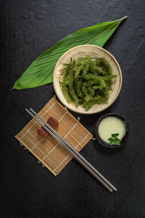 Umi-budou Seaweed or Green Caviar Healthy sea food or sea grapes seaweed on plate, Caulerpa lentillifera - sea grapes or green caviar.の写真素材