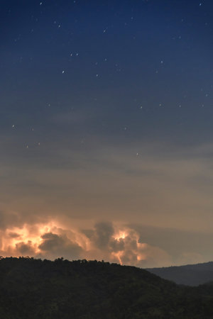 Thunderstorm Clouds with Lightning, Lightning with dramatic clouds (composite image). Night...