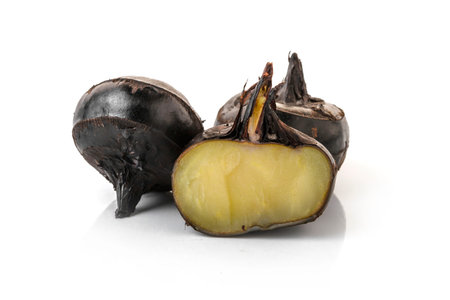 Isolated macro image of water chestnut on white background.