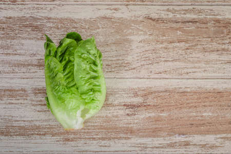 Fresh Romano salad on wooden table.の写真素材