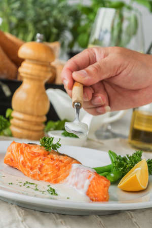 Salmon fish fillet grilled steakand vegetable on plate.の写真素材