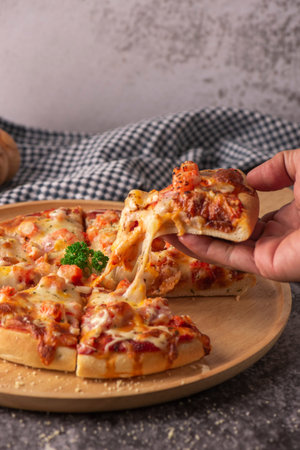 Slice of pizza cheese crust seafood topping sauce. with bell pepper vegetables delicious tasty fast...