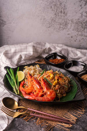 Delicious rice noodles with shrimp and vegetables close-upの写真素材