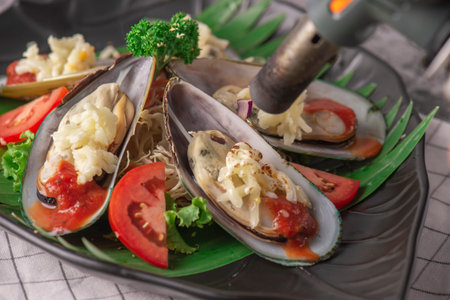 Baked Mussel with cheese and herb