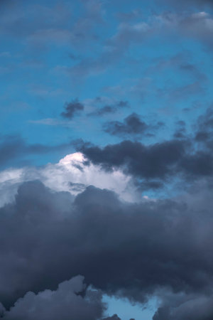 Before heavy rain storm. On the sky is covered all over by the clouds. A lot of lightning and strong...