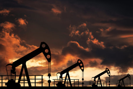 oil pump oil rig energy industrial machine for petroleum in the sunset background for design