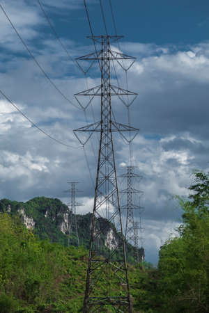 high voltage pole Sky background rain clouds.の写真素材