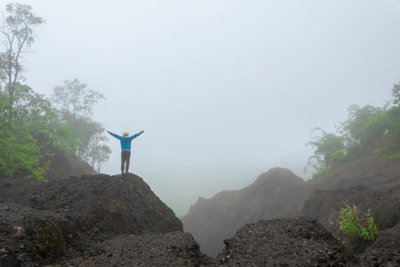 Travel Hiking Along Forest Mountain view Morning mist In Asia. The Concept of Active adventureの写真素材
