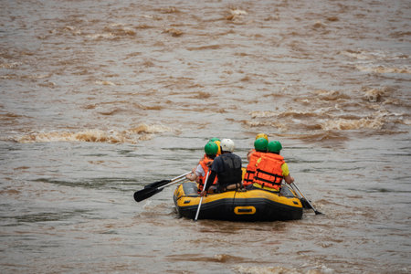 Chiang Mai, Thailand - August 18, 2019: Rafting on the Kaeng Khuod river, North Thailand, A group of men and women are rafting on the river, extreme and fun sport.のeditorial素材