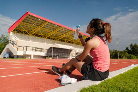 Sporty asian woman runner in fashionable sportswear, Concepts of running and exercise for health.の写真素材