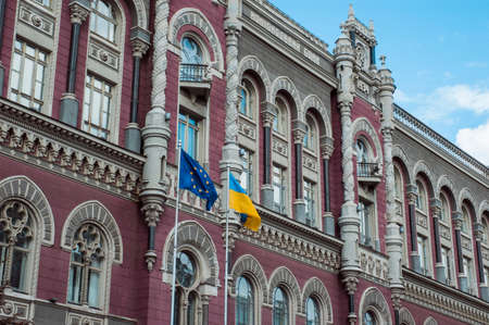 Kyiv / Ukraine - July 31, 2020: Main beautiful building National Bank of Ukraine with European Union and Ukrainian flags swaying in frontのeditorial素材