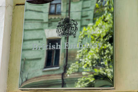 Kyiv / Ukraine - July 28, 2020: Shiny metalic sign board of British Embassy in Kyivのeditorial素材