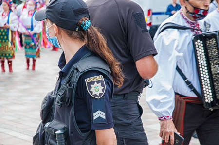 Kyiv / Ukraine - July 17, 2020: The law enforcement officers back to back near the Verkhovna Rada of Ukraine. Policemens on their dutyのeditorial素材