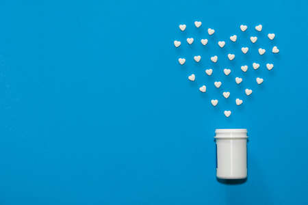 The figures of pills on the backgroundの写真素材