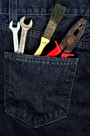 Toolkit in jeans pocket  Repairman work wear themeの写真素材