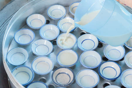 coconut milk custard in small porcelain cupの写真素材
