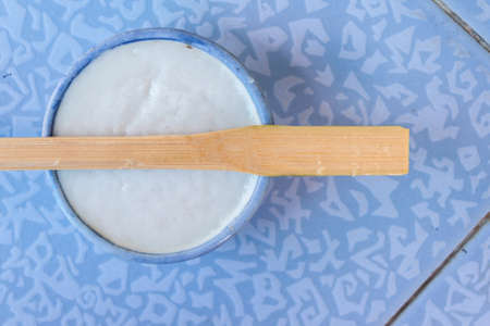 coconut milk custard in small porcelain cupの写真素材