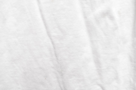 Abstract white fabric texture background. Wavy white cloth.