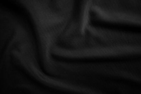 Background texture black cloth. Abstract dark wavy soft. Fabric is wrinkled. Fashion luxury style.の写真素材