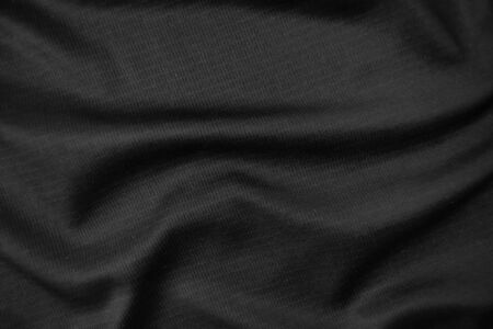 Background texture black cloth. Abstract dark wavy soft. Fabric is wrinkled. Fashion luxury style.の写真素材