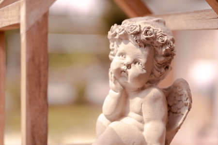 lovely cupid statue at the parkの写真素材
