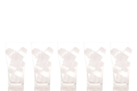 Ice in Glass on White Background. COPY SPACE.の写真素材