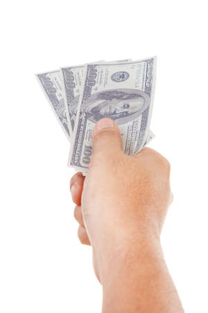 Hand holding US Dollar Banknote ISOLATED on White Backgroundの写真素材