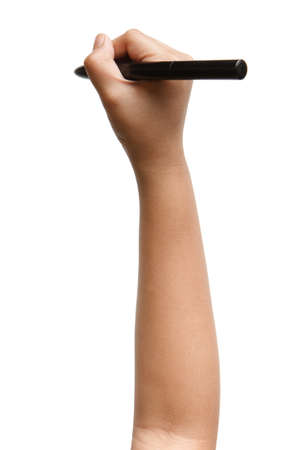 Hand Holding Pen. Writing hand. boy hand hold black pen write on the wall isolated on white Backgroundの写真素材