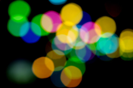 Colorful defocused multi color lights circular bokeh abstract background