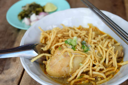 Khao Soi or Khao Soy, Typical Thai Northern style noodle in curry soupの写真素材