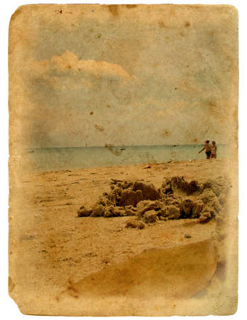 rest on the beach. The postcard, in a stylized grunge and retro style. Isolated on white backgroundの写真素材