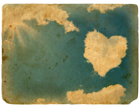 The sky and cloud in the shape of the heart. Abstract background, grunge and retro stylingの写真素材