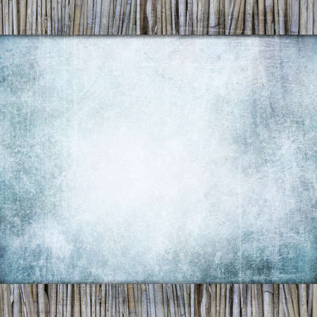 Blue background image for the photo album, photo book. Texture of the paper with a border of bamboo reedsの写真素材