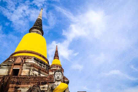 The Buddha statue and ancient remains in the Thailandの写真素材