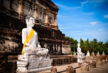 The Buddha statue and ancient remains in the Thailandの写真素材