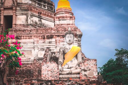 The Buddha statue and ancient remains in the Thailandの写真素材