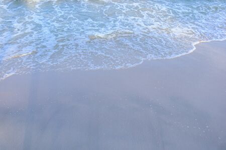 Beautiful wave on the beach, clear water, white sand in your holiday at andaman sea Phuket Thailand.の写真素材