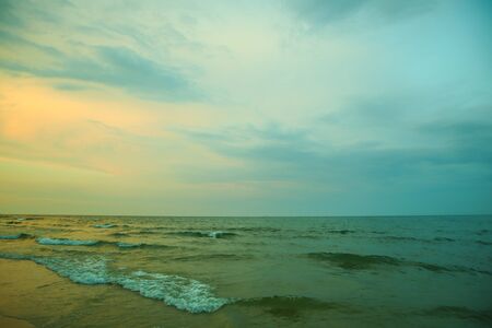 Beautiful wave on the beach, clear water, white sand in your holiday at andaman sea Phuket Thailand.の写真素材