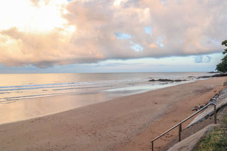 Beautiful beach with white sand, turquoise ocean water and blue sky with clouds in sunny day.の写真素材
