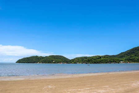 Mountain sea sand beach landscape. Sea sand beach in mountains. Mountain sea beach landscape. Mountain beach viewの写真素材