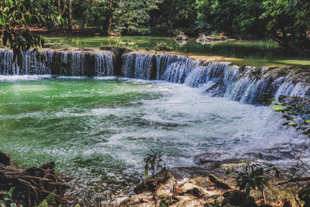 Beautiful waterfall in deep forest at Thailand.