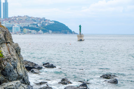 Small lighthouse tower in the sea near an island in the Caribbeanの写真素材