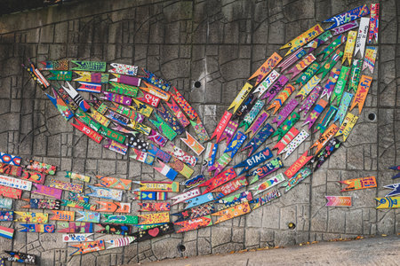 A colorful painted fish wall at Gamcheon Culture Villageの写真素材